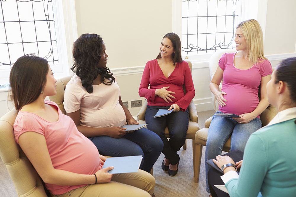 Group of pregnant women meets to discuss challenges and how to handle access to care.