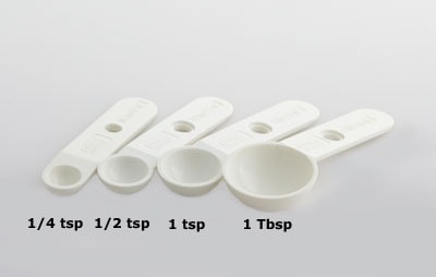 Four measuring spoons of varying volume