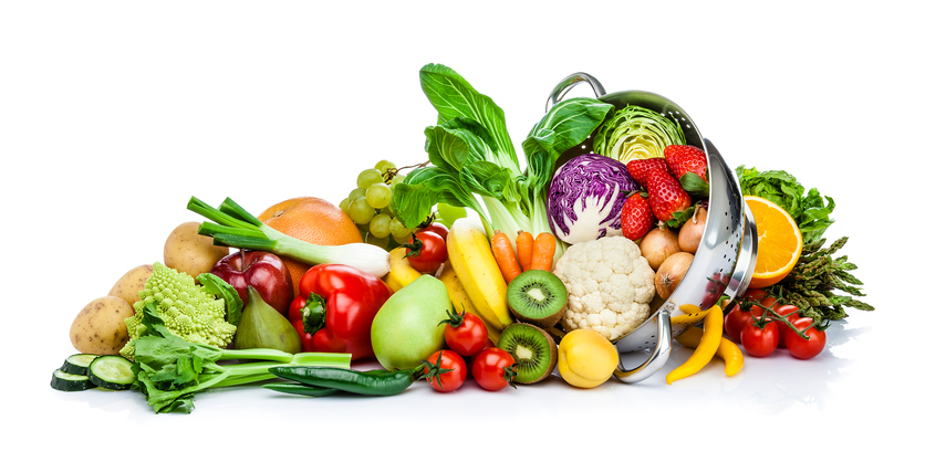 Variety of fruits and vegetables piled together.