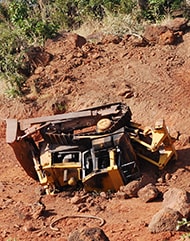 Bull dozer that has tipped over