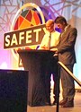NIOSH Director John Howard and ASSE President Michael Belcher sign the partnership agreement at the ASSE annual conference. 