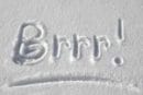 The word Brrr written in the snow.
