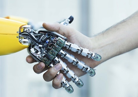 robotic hand shaking a human hand