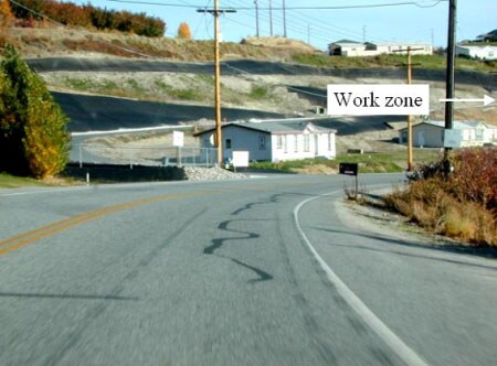 Photograph 1. View approaching the work zone from the south (direction from which the intruding vehicle approached).