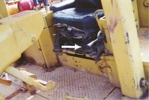 arrow points to the transmission neutral safety lock, the buldozer is ready for  movement