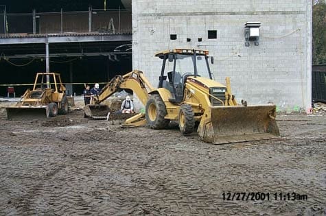 Exhibit #1. View of the incident scene showing the backhoe and the work area involved.