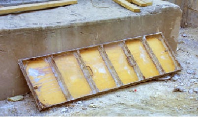 Photo 3 -- Typical plywood and steel cement form.