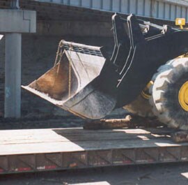 Figure 11. Two chains on loader’s bucket