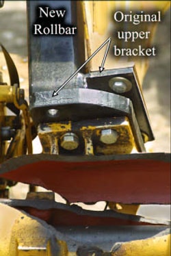 Photo 3 – Close-up view of right axle showing construction of rollbar and its attachment to the axle housing with short bolts.
