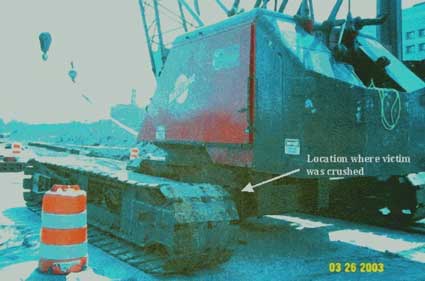 Figure 3 – Location where victim was crushed, between the left rear track and the superstructure.