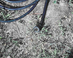 Picture #4: Black extension cord male end.