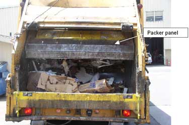 Exhibit 3. A picture of a rear loading trash truck, similar to the one involved in the incident, with the packer panel at the beginning of its cycle.