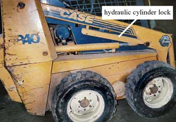 Photo 4 - Hydraulic cylinder lock in stowed position.