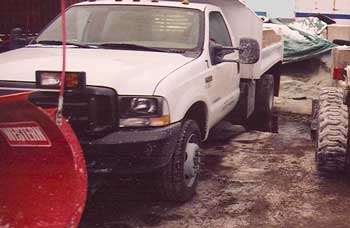 Figure 1. Snow Plow with a salt spreader in the dump box.