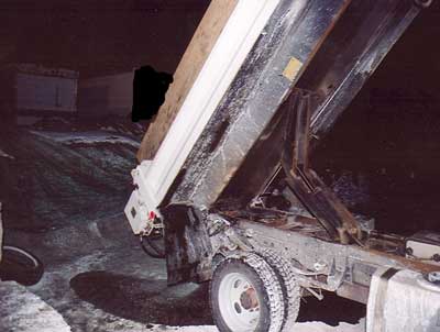 Figure 3. Raised dump body of the truck.