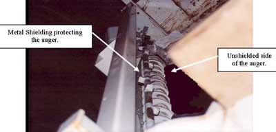 Figure 4. The auger at the rear of the dump box.