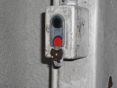 Exhibit 5: The equipment on/off switch at the exit of the tunnel.