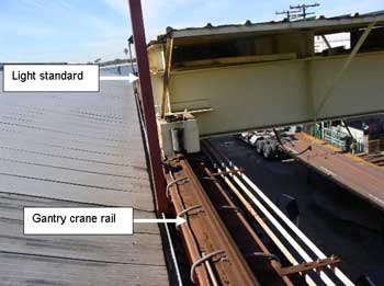 Exhibit 4: The rail the gantry crane rides on and the close proximity to the light standard.