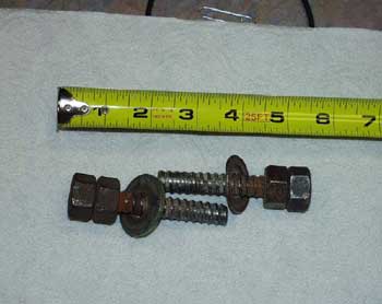 Attachment 5. Bolts that were screwed into threaded inserts on concrete “cap” that fell.