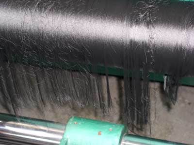 threads that were being wound on the spool 