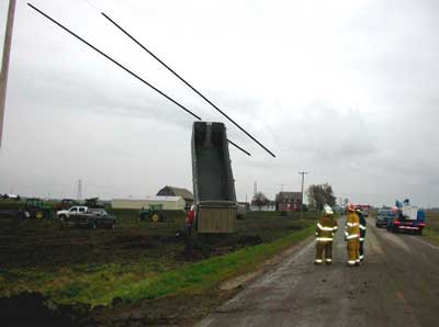 truck bed lifted into power lines