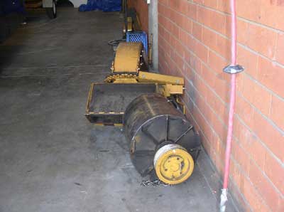 discharge chute and drum from brush chipper