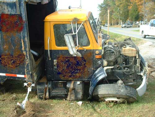 solid waste truck after accident