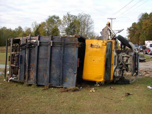 waste truck rolled over