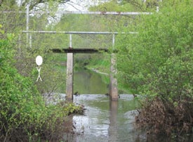 Downstream side of the water level control structure, looking west, showing decedent’s location under the structure