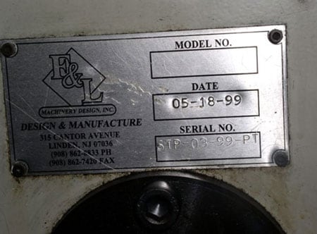 A picture of the name plate affixed to the machine.
