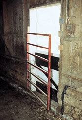light metal gate in barn