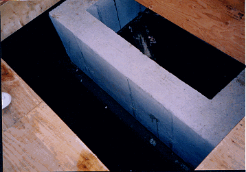 floor opening and concrete chimney footing