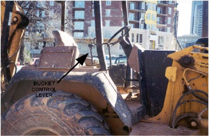 This photograph was taken from the right of the backhoe/loader.