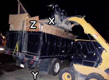 Trash truck showing victim's approximate locations before and after his fall and scrap plywood pieces