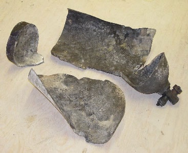 Photo 2. Fragments of the exploded nitrous oxide cylinder.
