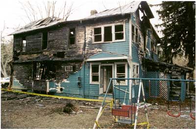 Photo 2. Rear of incident structure