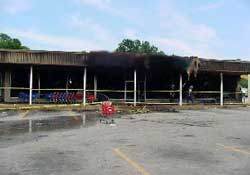 Commercial structure involved in arson fire.
