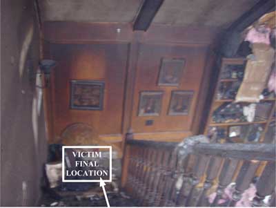 arrow pointing to bottom of stairwell indicating the final location of victim