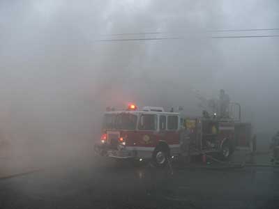 fire truck sitting in heavy smoke