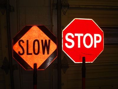 Stop sign and slow sign