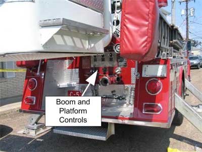 rear of aerial fire truck with platform controls