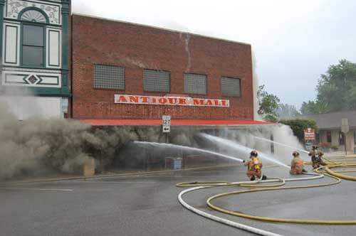 3 hoses lines attacking the fire