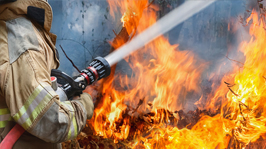 Job Hazards firefighter fighting a wildfire