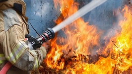 firefighter fighting a wildfire