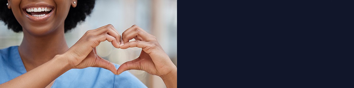 May is Mental Health Awareness Month Woman forming a heart shape with her hands