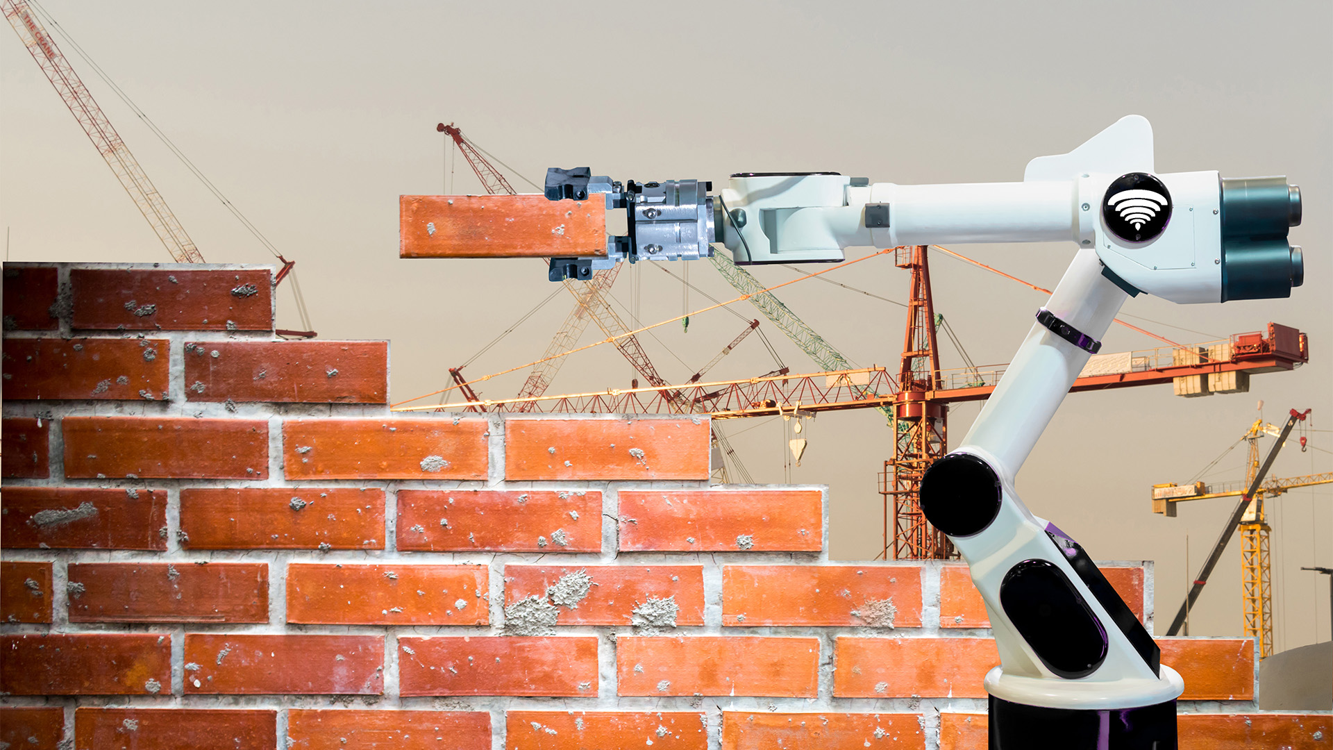 robotic arm laying bricks