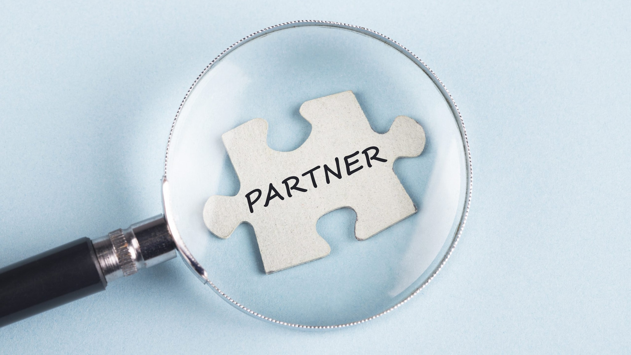 puzzle piece with "partner" on it.