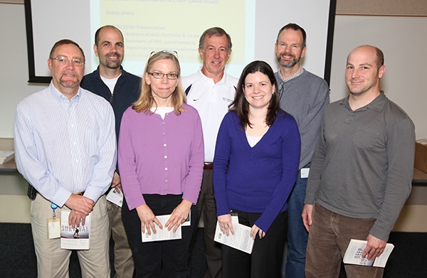 Dr. Johns with other senior federal scientists who collaborated to develop a strategic research plan.