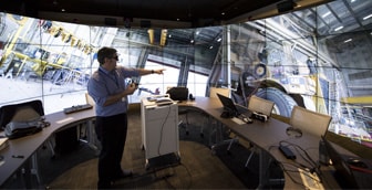 Orr points out details in a 360-degree view of a maintenance shop.
