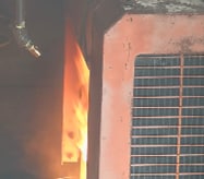 Photo of hot surface experiments in the NIOSH fire facility to determine ignition temperatures of selected fuel types, airflow speeds, and surface material types. 